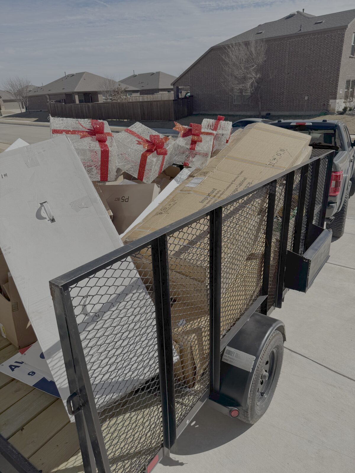 Loaded trailer of debris on a DFW job